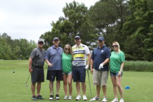 tmba golf tournament 2016 group photo 6 people trees in background
