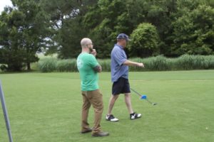 tmba golf tournament 2016 staff and player on course