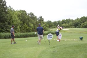 tmba golf tournament 2016 men at tee one swinging
