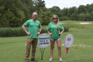tmba golf tournament 2016 2 priority staff members posing on green