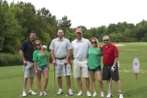 tmba golf tournament 2016 group photo 6 people green in background