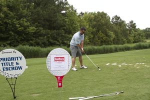 tmba golf tournament 2016 man teeing off signs priority title southern auto