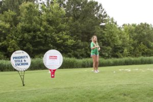 tmba golf tournament 2016 woman laughing back from tee