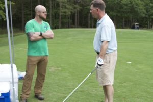 tmba golf tournament 2016 2 men talking