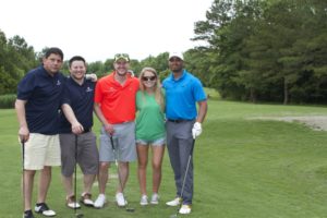 tmba golf tournament 2016 5 posing together on fairway v2