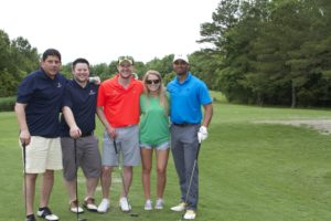 tmba golf tournament 2016 5 posing together on fairway